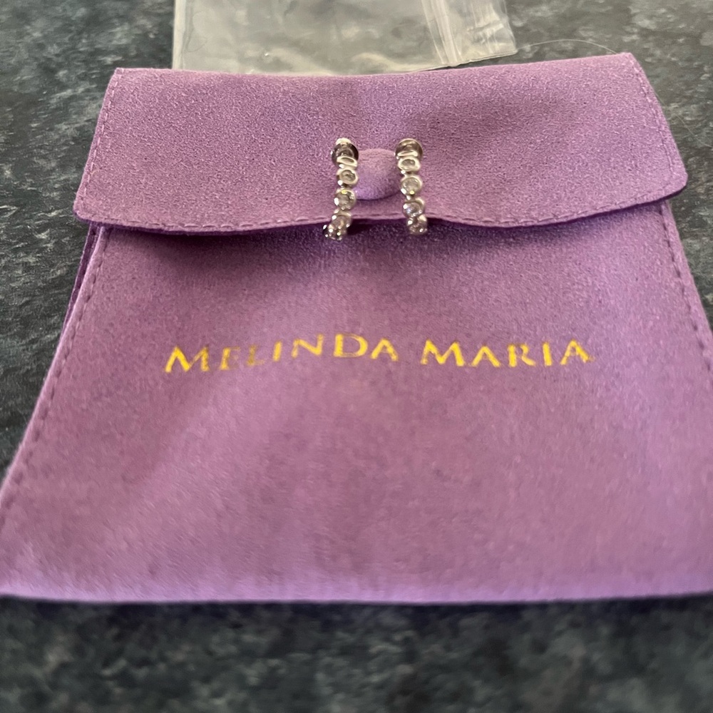 Melinda Maria “She’s So Cute” Huggie Earrings new with storage pouch